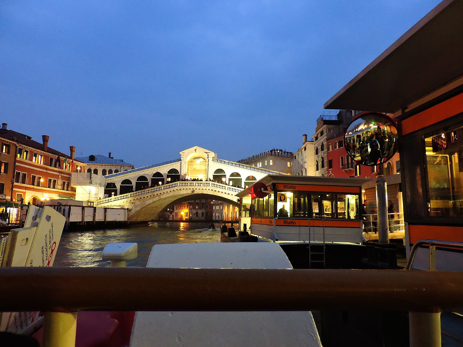 View of Rialto Bridge from a vaporetto on the Grand Canal in Venice